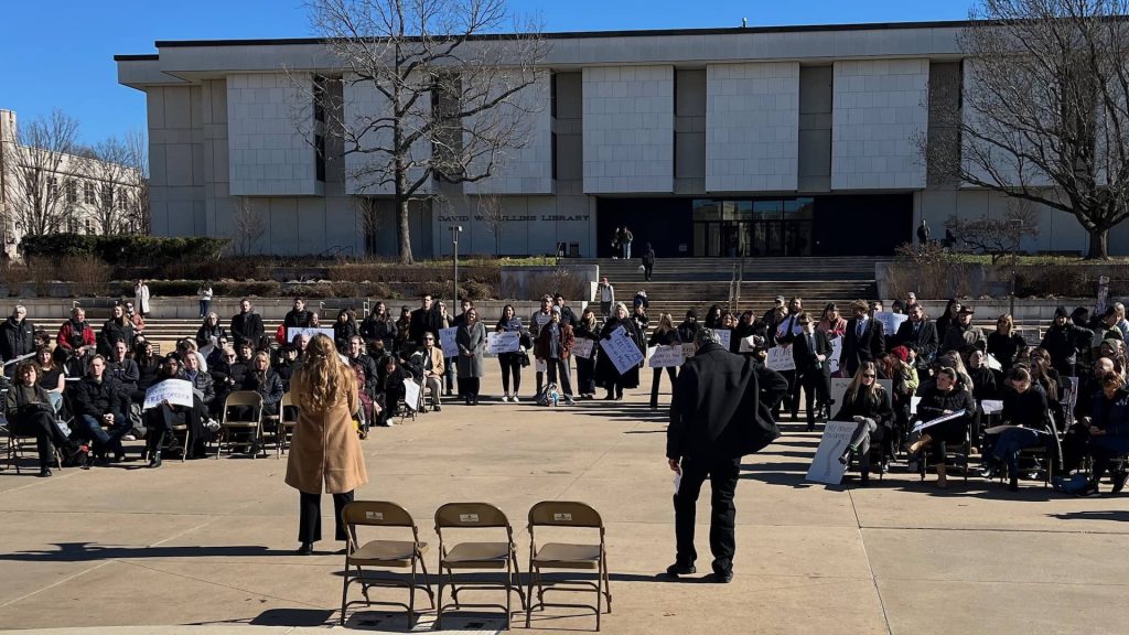 Following a march through the University of Arkansas campus Tuesday, Jan. 20, 2026, UA Law students and supporters gathered for a rally.