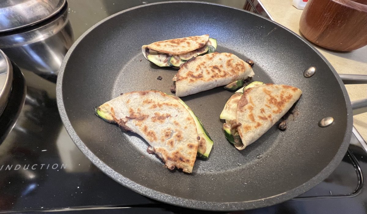 Four taco-dillas just after cooking